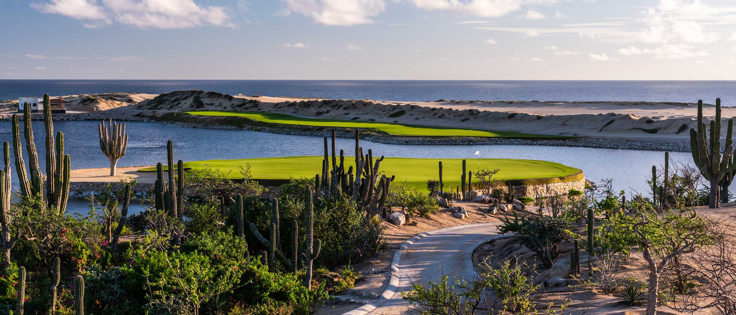 Aerial view of Pacific Dunes golf course with dramatic desert landscape