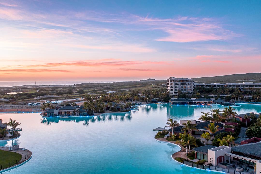 Stunning sunset view of the 10-acre Crystal Lagoon - Mexico's largest swimming lagoon